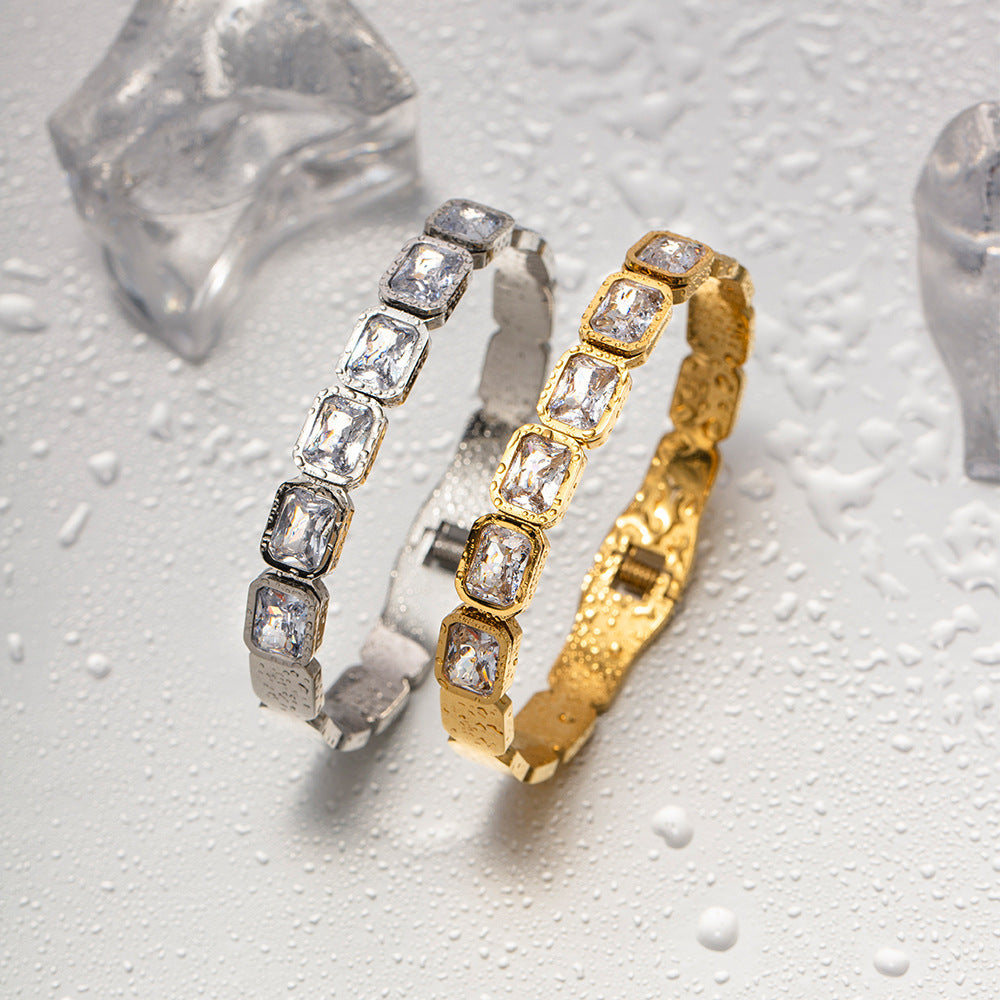 Eleganza Damen Armband aus Titanstahl mit Zirkon-Intarsien in Gold